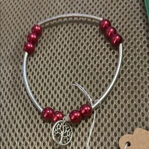 Elegant Silver and Red Beaded Bracelet